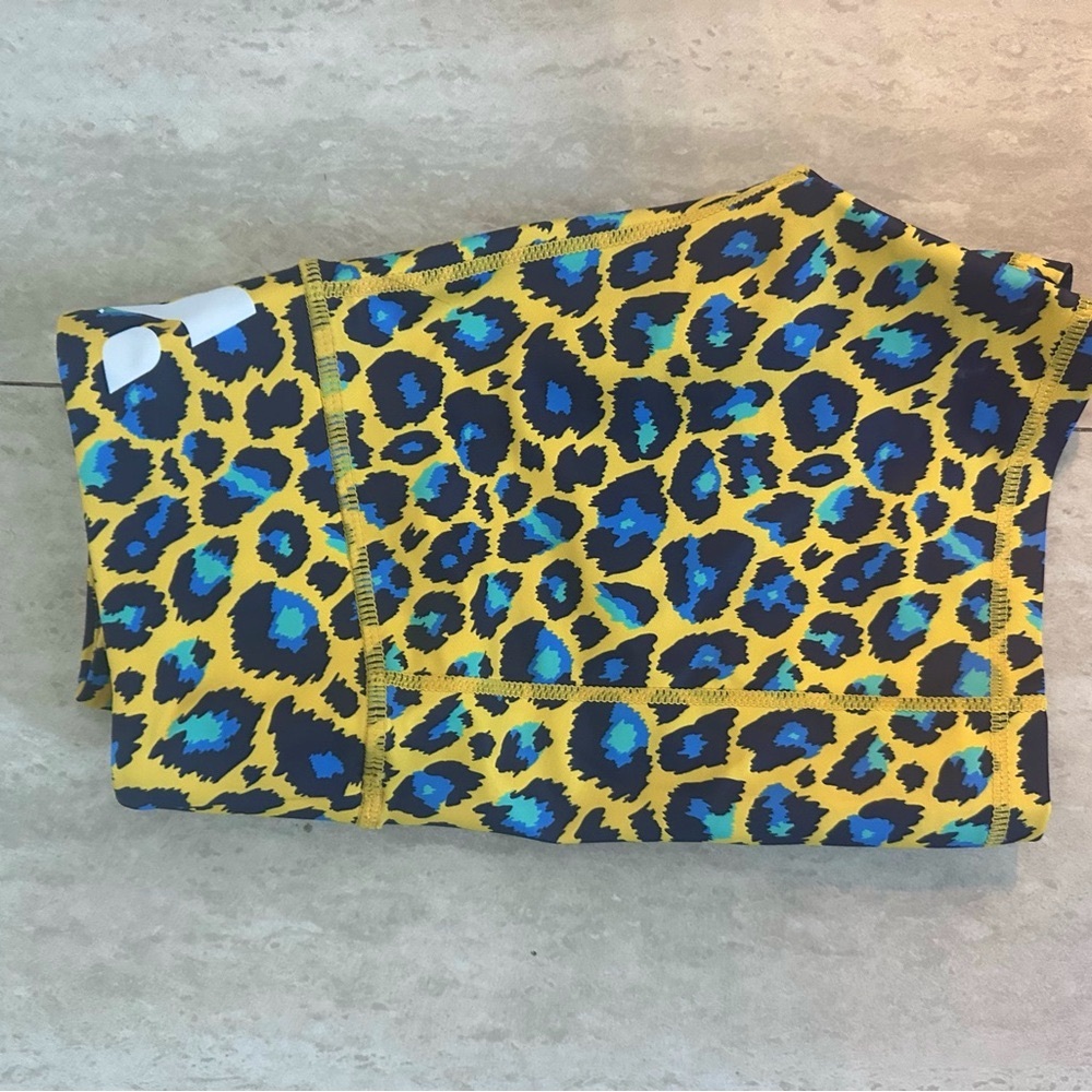 Yellow and Blue Athletic Shorts with Vibrant Leopard Print